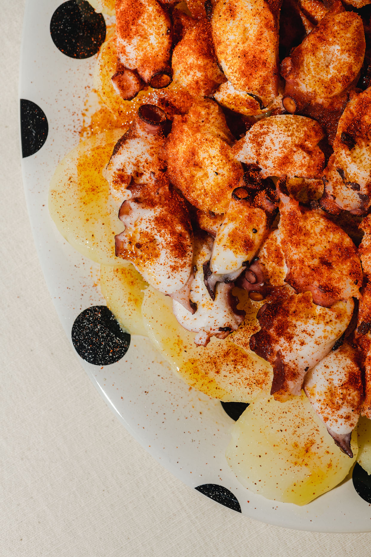 Close-up of finished grilled octopus with paprika and olive oil